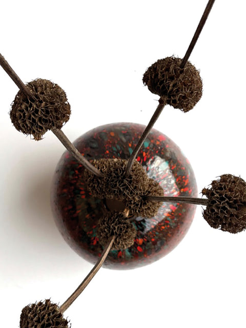 Top Down View with Flowers of the Crimson Fiery Marble Sphere Handmade & Handblown Large Glass Vase