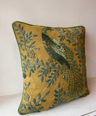 Sequinned cushion in green, peacock motify