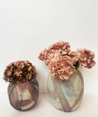 Lifestyle Shot of Ebb & Flow Handblown Marble Vase in Mute Pink & White