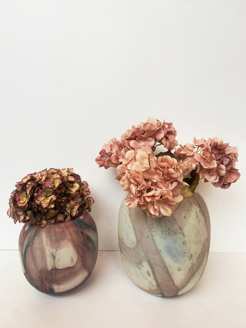 Lifestyle Shot of Ebb & Flow Handblown Marble Vase in Mute Pink & White