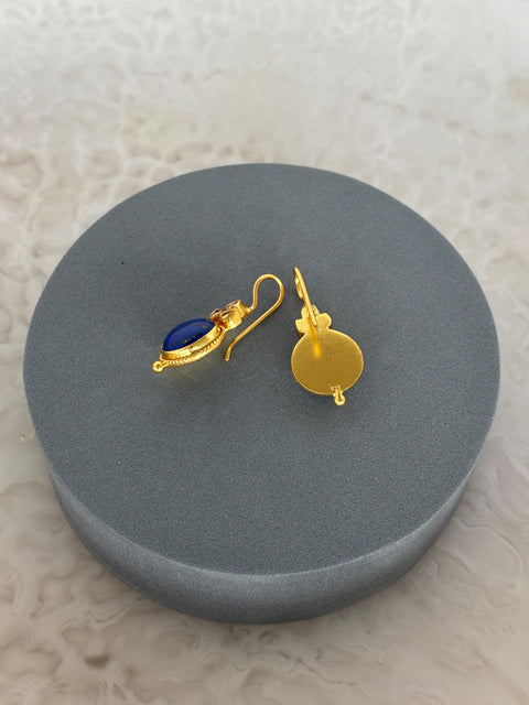 Rear View of Amaya Sterling Silver Gold Plated Dangle Lapiz Lazuli Earrings on Grey Pillow