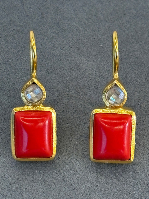 Close Up Shot of Sterling Silver Gold Plated Leila Earrings Set With Red Coral Gemstone