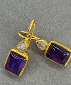 Close Up Shot of Sterling Silver Gold Plated Leila Earrings Set With Purple Amethyst Gemstone