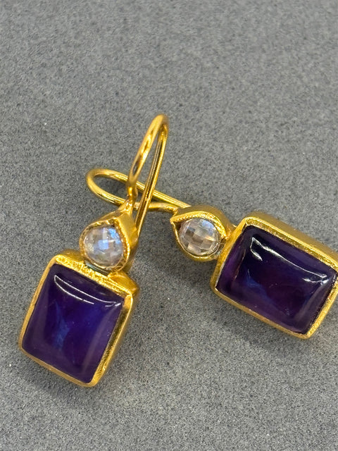 Close Up Shot of Sterling Silver Gold Plated Leila Earrings Set With Purple Amethyst Gemstone