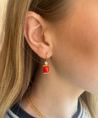 Lifestyle Shot of Sterling Silver Gold Plated Leila Earrings Set With Red Coral Gemstone