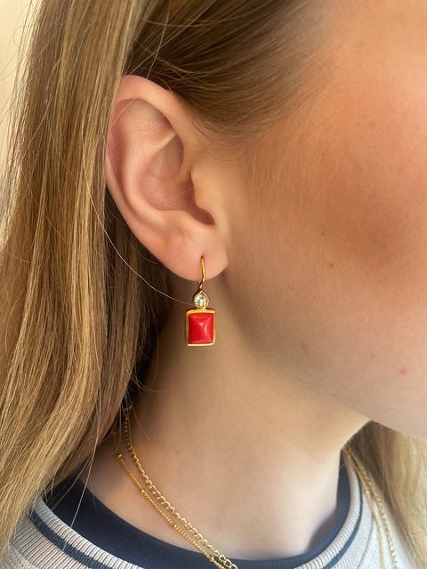 Lifestyle Shot of Sterling Silver Gold Plated Leila Earrings Set With Red Coral Gemstone