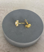 Rear View of Sterling Silver Gold Plated Nayantara Pearl Earrings on Grey Pillow