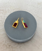 Angle Shot of Sterling Silver Gold Plated Meera Earrings Set With Red Quartz and Turquoise Gemstones