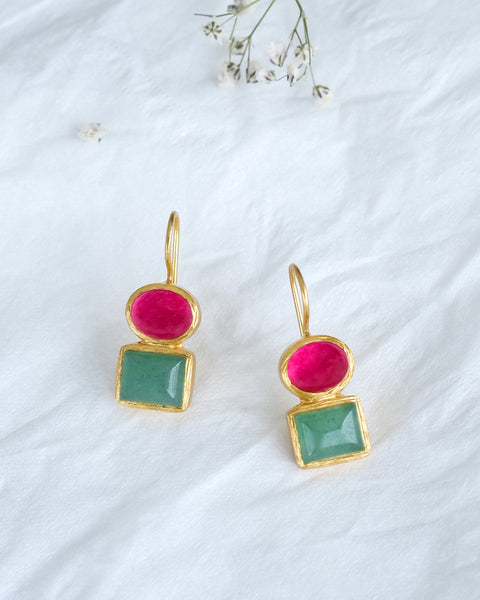 Roshni Sterling Silver Gold Plated Dangle Earrings with Aventurine and Red Quartz Gem on a White Marble Background