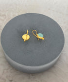 Rear Shot of Charvi Sterling Silver Gold Plated Aqua Chalcedony Earrings Handcrafted in Jaipur On a Grey Pillow