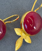 Close Up Shot of Maryam Sterling Silver Gold Plated Handcrafted Red Quartz Gem Earrings