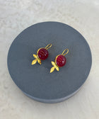Angle Shot of Maryam Sterling Silver Gold Plated Handcrafted Red Quartz Gem Earrings