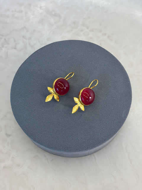 Angle Shot of Maryam Sterling Silver Gold Plated Handcrafted Red Quartz Gem Earrings