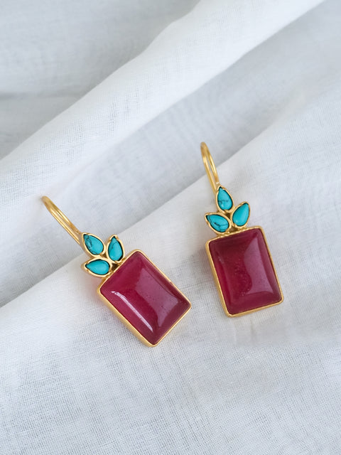 Front Shot of Sterling Silver Gold Plated Meera Earrings Set With Red Quartz and Turquoise Gemstones On A White Background