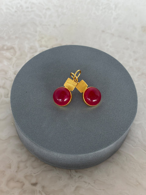 Front Facing Shot of Red Quartz Dangle Kaira Earrings Made With Sterling Silver and Gold Plated