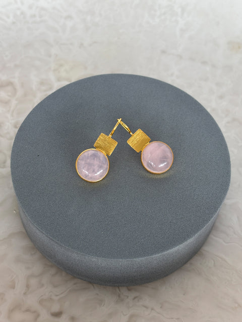 Front Facing Shot of Rose Quartz Dangle Kaira Earrings Made With Sterling Silver and Gold Plated