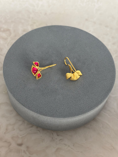 Rear View of Sterling Silver Gold Plated Nayantara Red Quartz Earrings on Grey Pillow