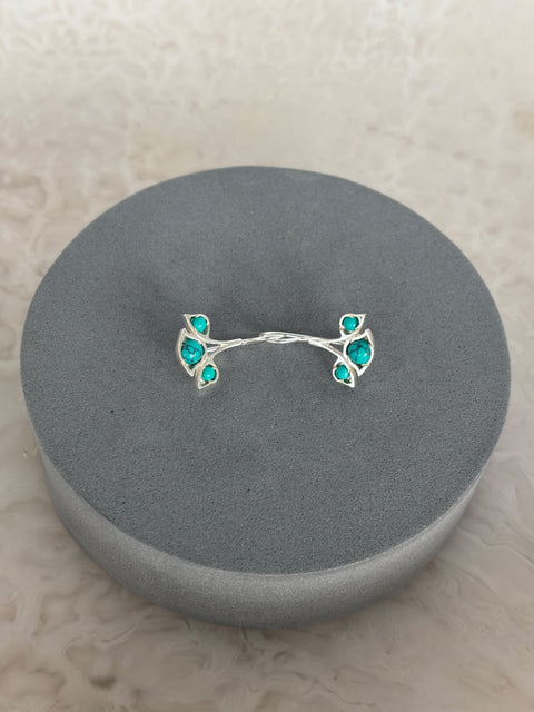 Rear View of Sterling Silver Nayantara Turquoise Gem Earrings on Grey Pillow